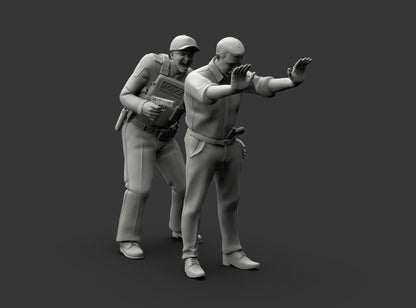 MM1225 Policeman Patting Down Armed Suspect