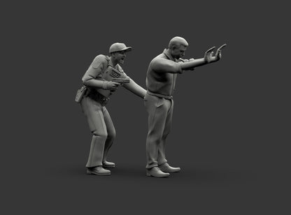 MM1225 Policeman Patting Down Armed Suspect