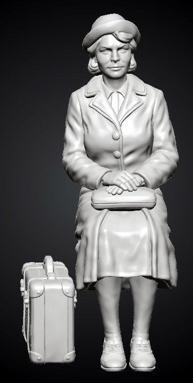 MM1492 Seated Female Passenger with Suitcase on Ground