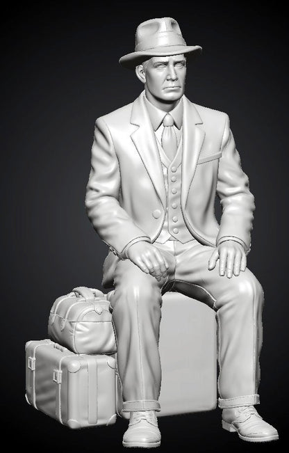 MM1495 Seated Gentleman on Suitcase with Fedora