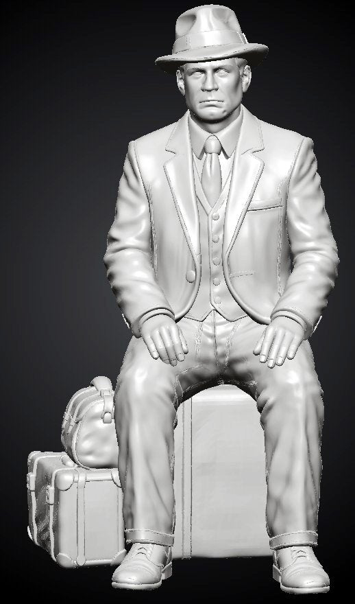 MM1494 Seated Gentleman in Suit and Fedora with Stacked Luggage