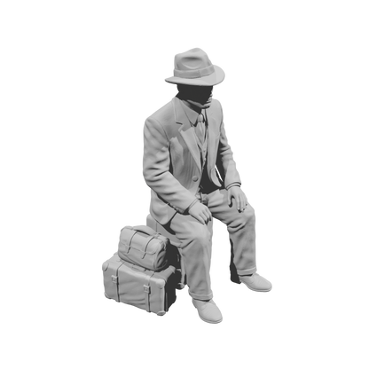 MM1494 Seated Gentleman in Suit and Fedora with Stacked Luggage