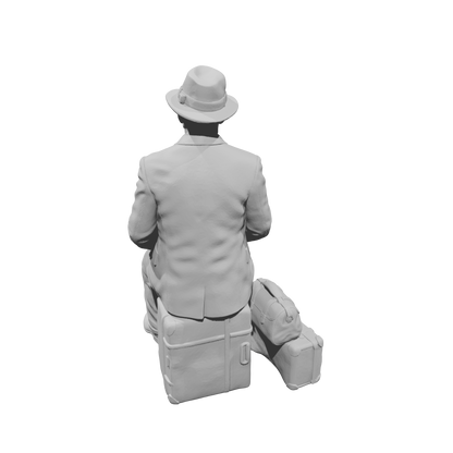 MM1494 Seated Gentleman in Suit and Fedora with Stacked Luggage