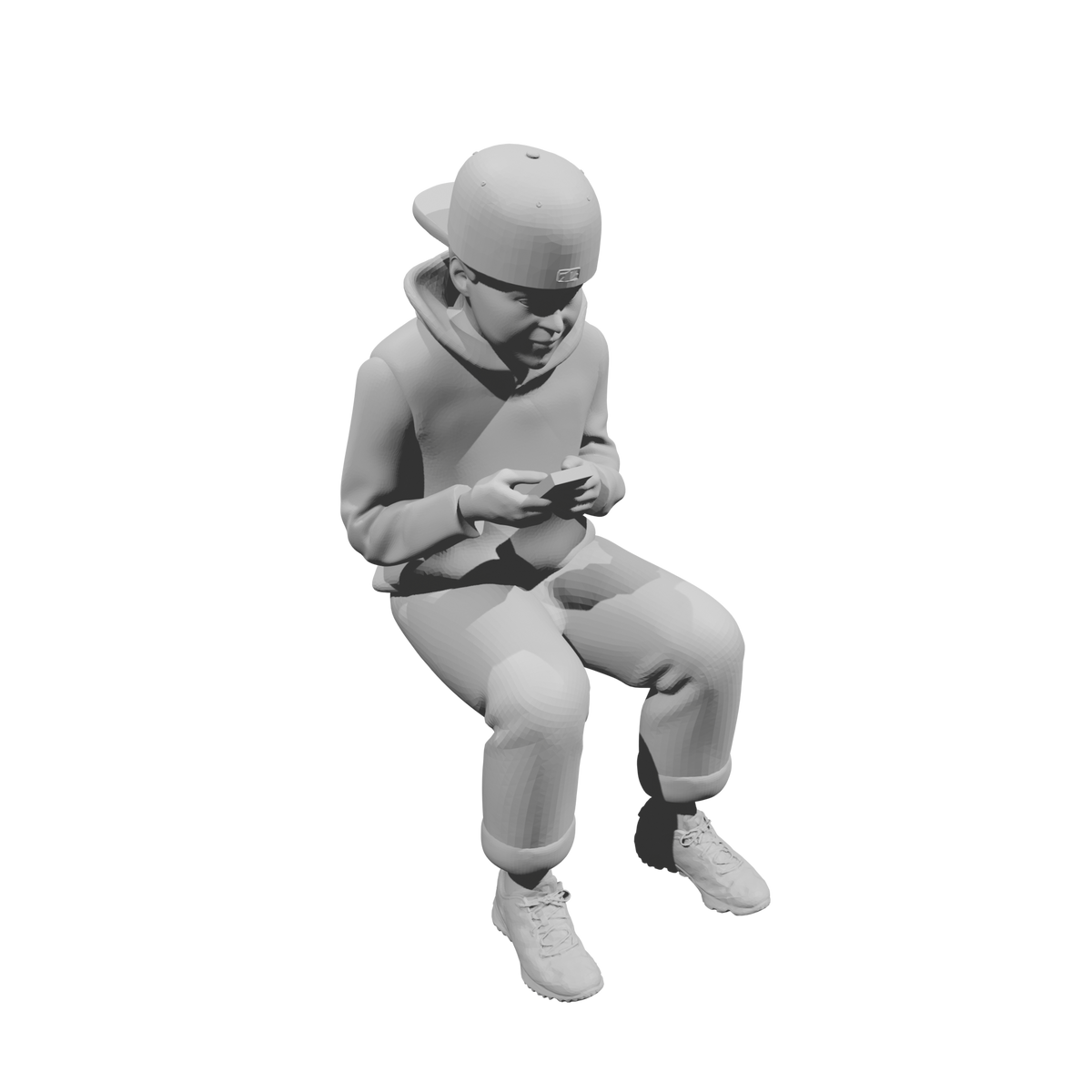 MM519Seated Boy in Hoodie Using Smartphone