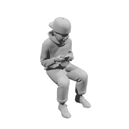 MM519Seated Boy in Hoodie Using Smartphone
