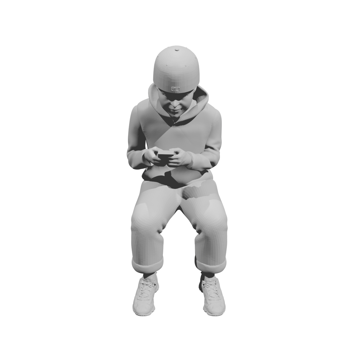 MM519Seated Boy in Hoodie Using Smartphone