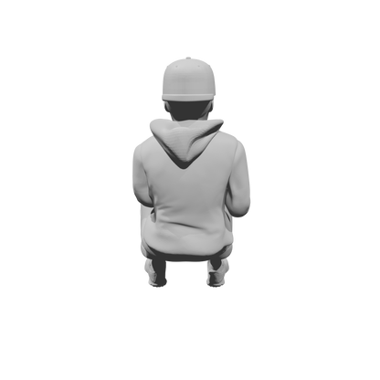 MM519Seated Boy in Hoodie Using Smartphone