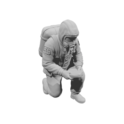 MM2184 Hazmat Materials Crew-16 Kneeling with Handheld Scanner