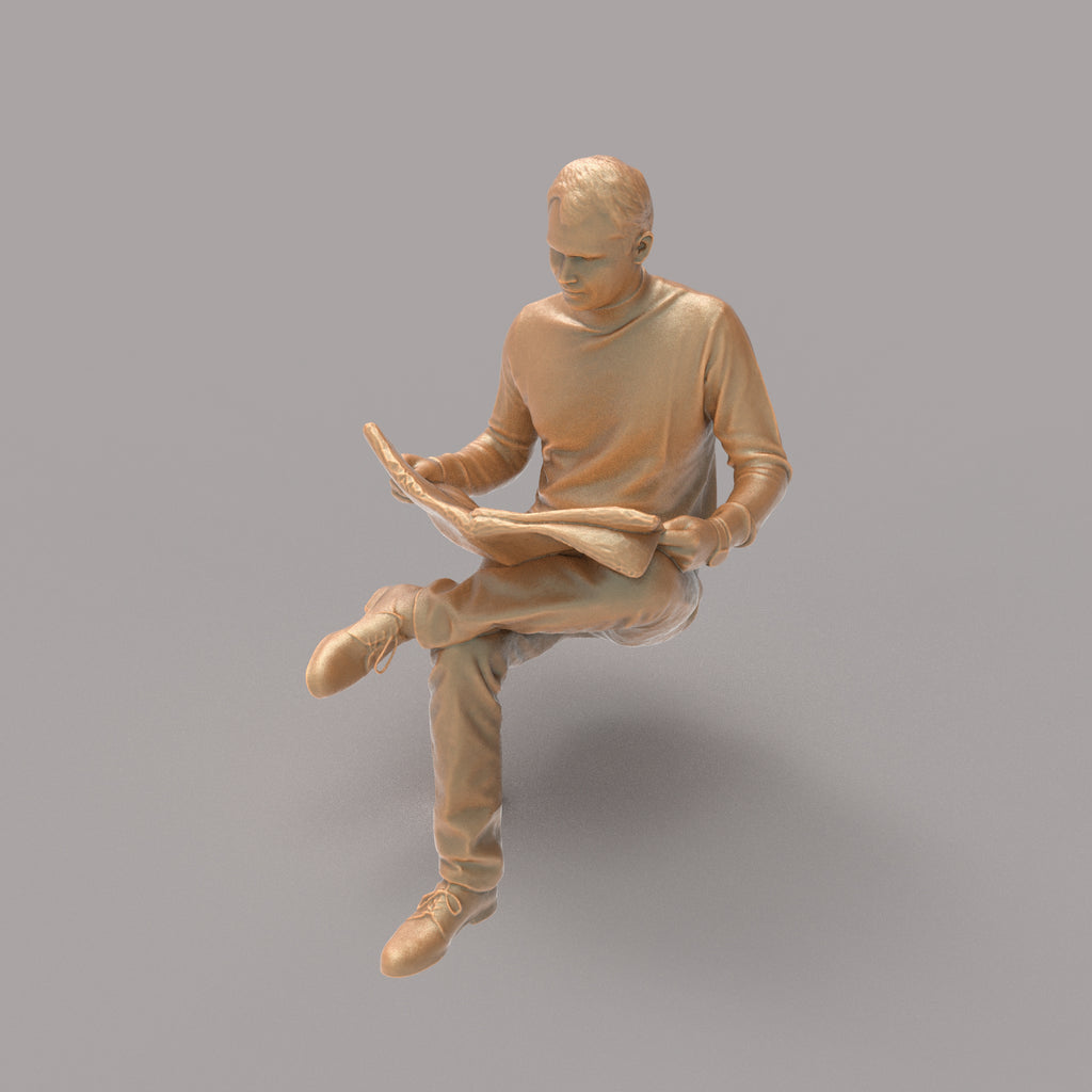MM127 Male Sitting Reading newspaper