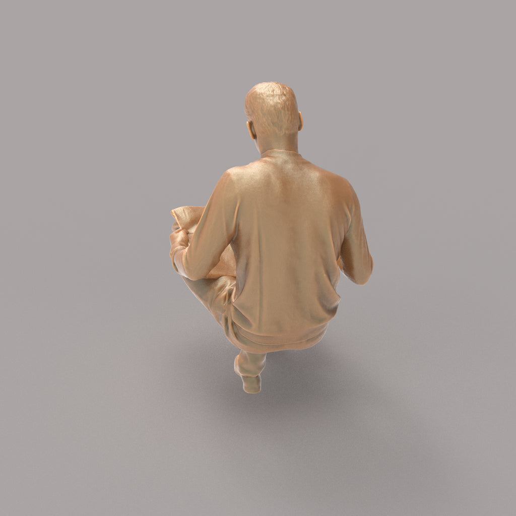 MM127 Male Sitting Reading newspaper