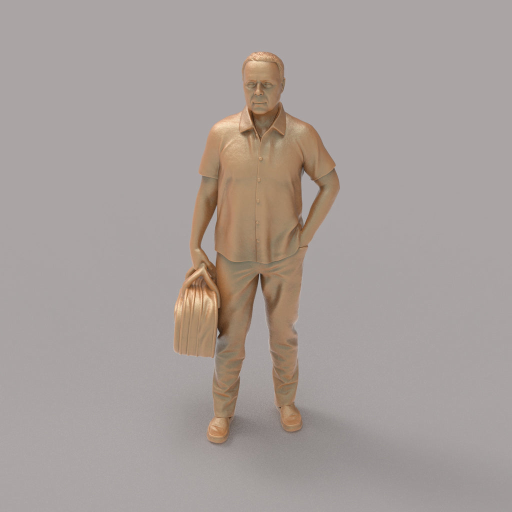 MM2094 Man With Bag waiting for a Train