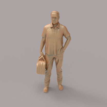 MM2094 Man With Bag waiting for a Train