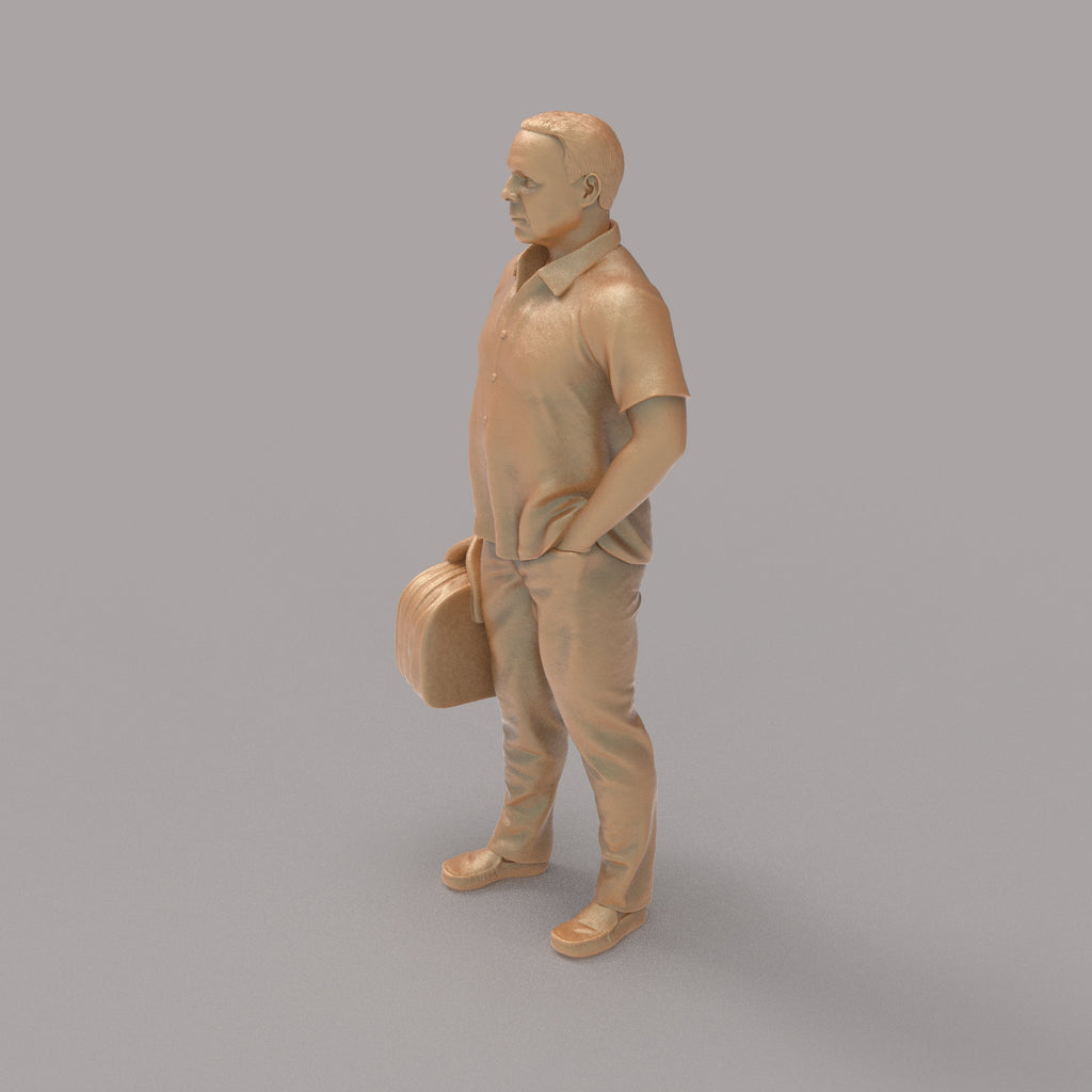 MM2094 Man With Bag waiting for a Train