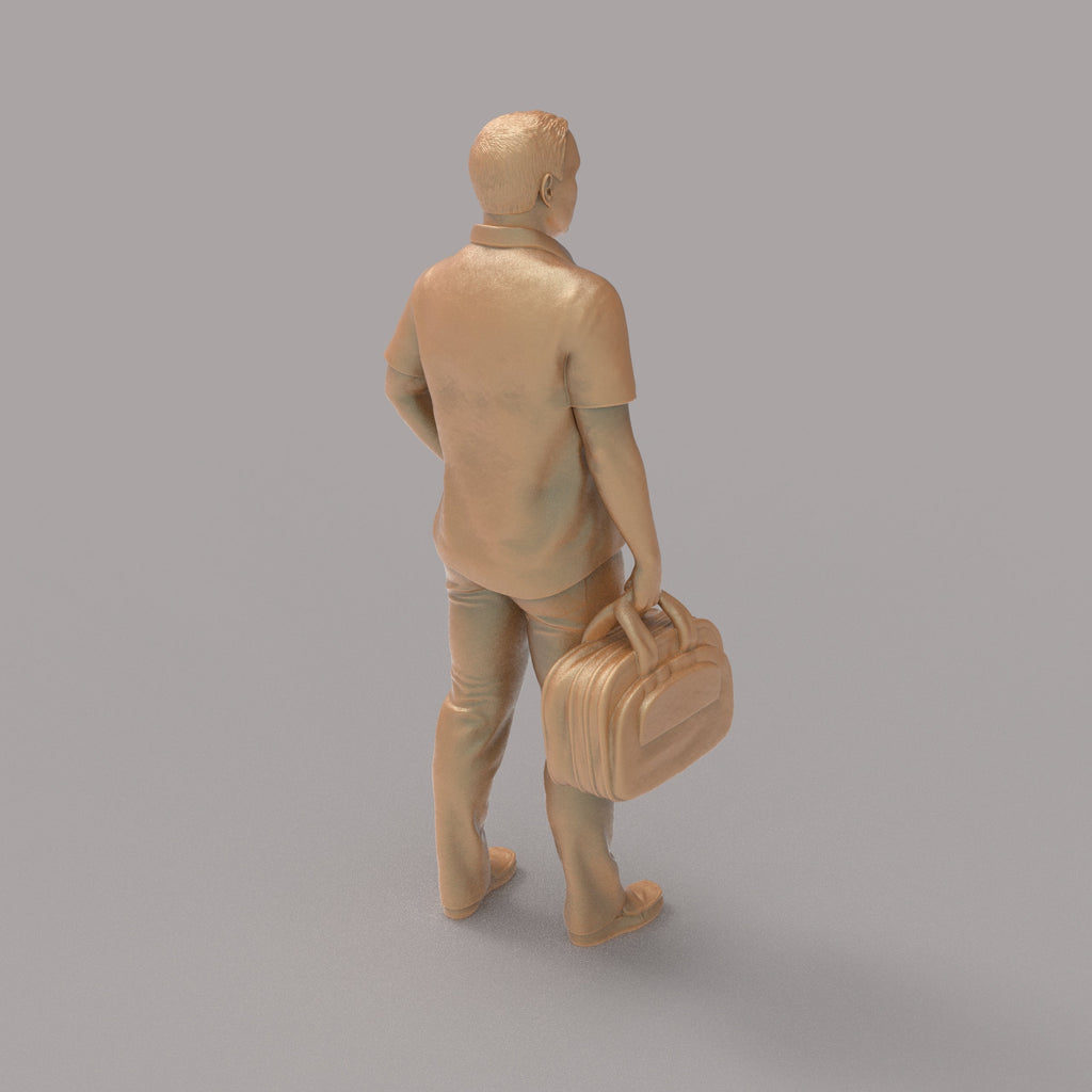 MM2094 Man With Bag waiting for a Train