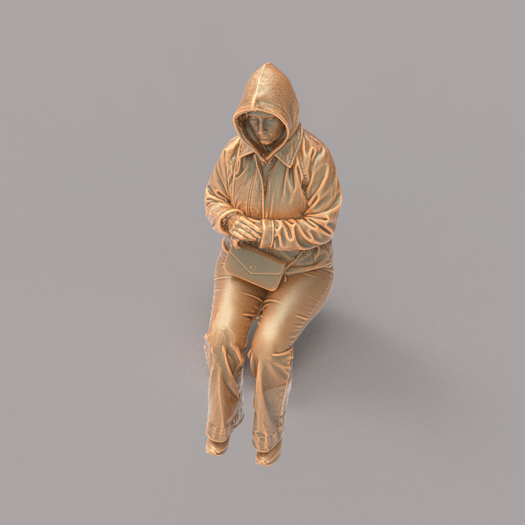 MM4163 Girl sitting in winter jacket