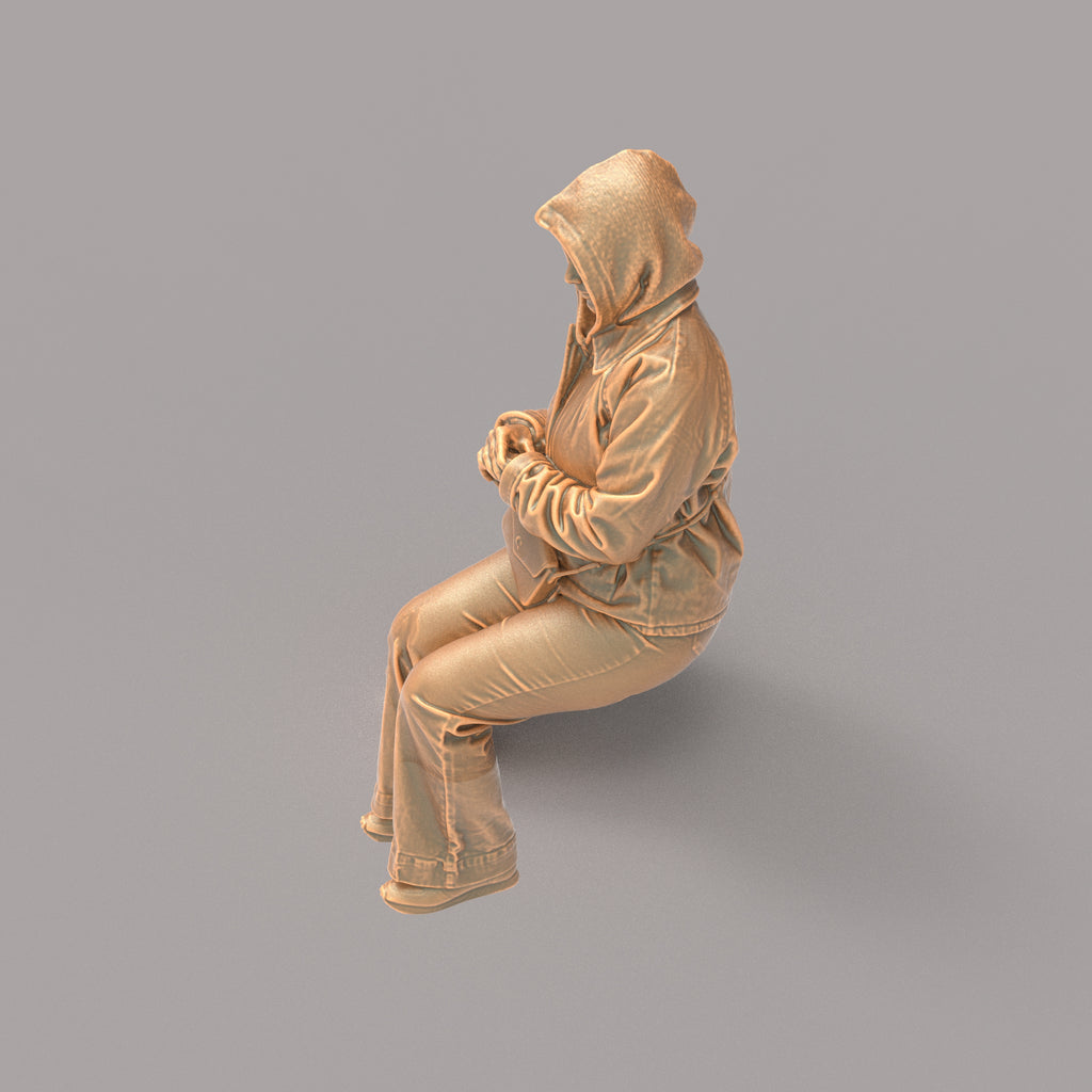 MM4163 Girl sitting in winter jacket