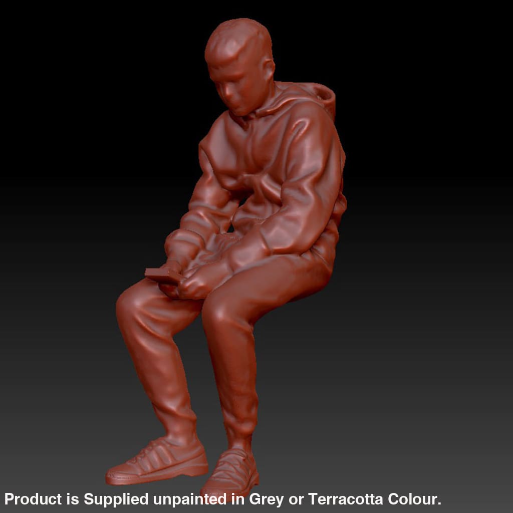 DSP252 Young Lad Sitting Figure