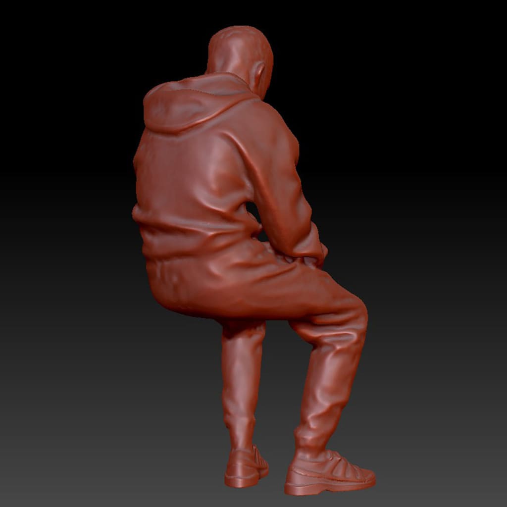 DSP252 Young Lad Sitting Figure