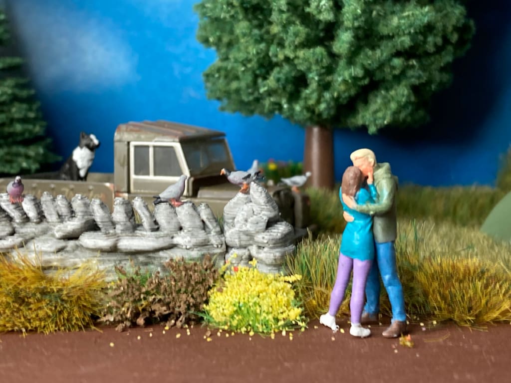 Young Kissing Couple Figure