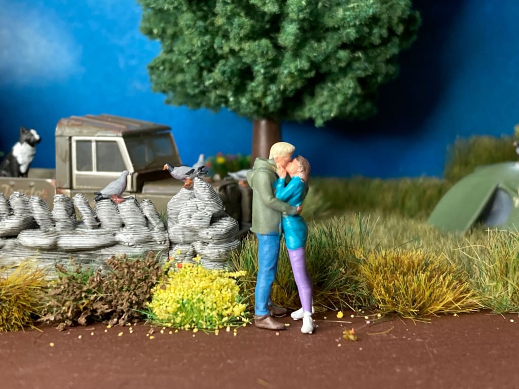 Young Kissing Couple Figure