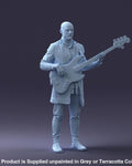 Male Playing Bass Guitar Figure