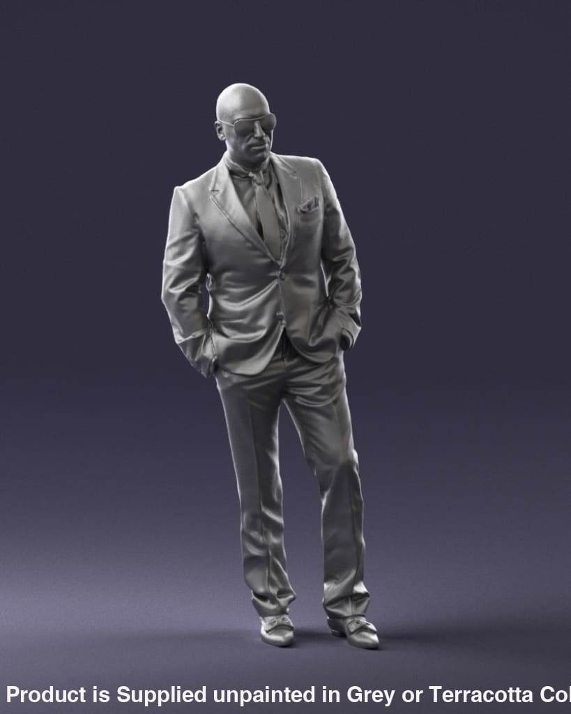 Bald Well Built Male In Suite Figure