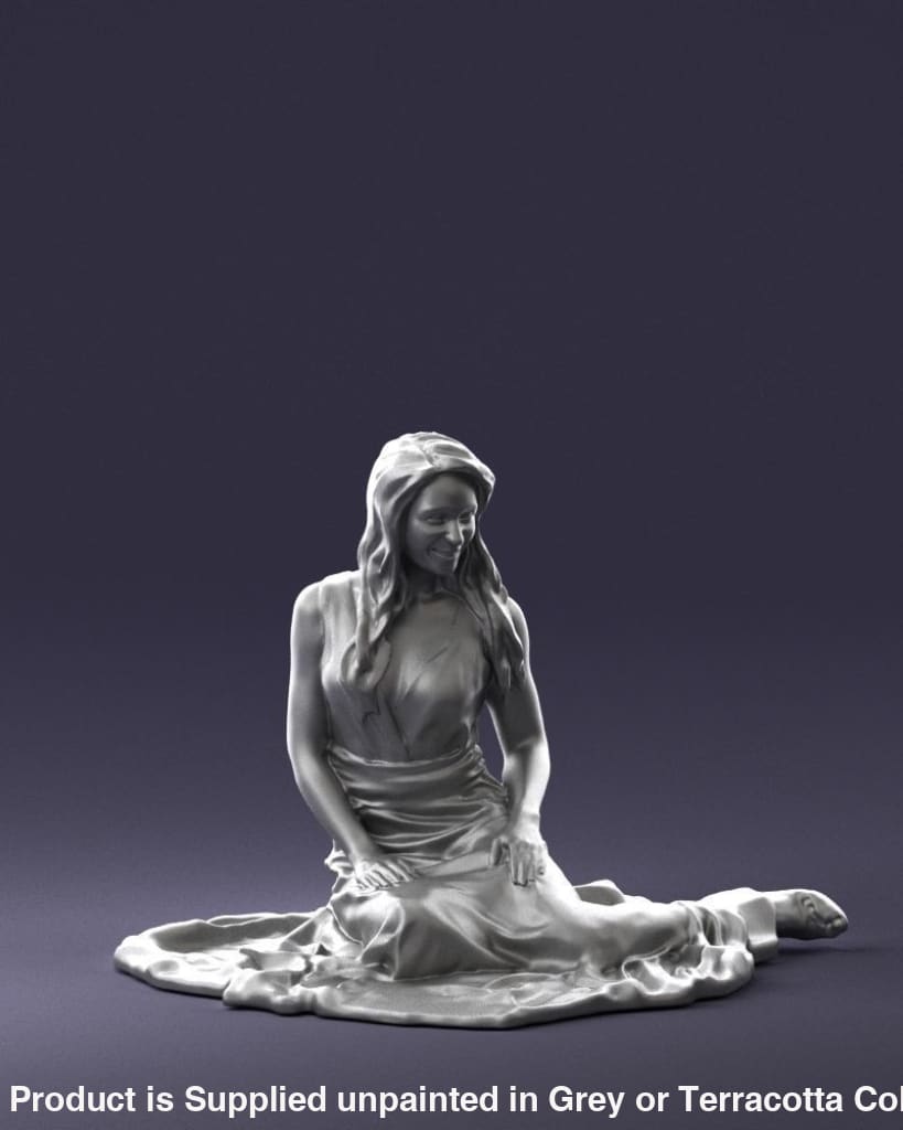 Young Girl In Long Dress Sitting On Floor Figure