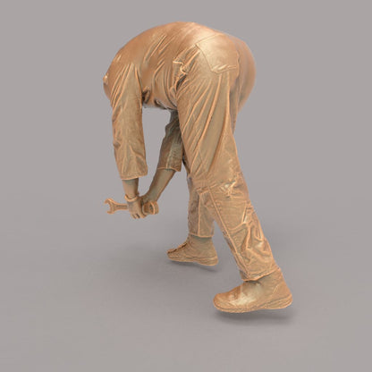 MM2106 Maintenance Worker Leaning over with spanner Figure