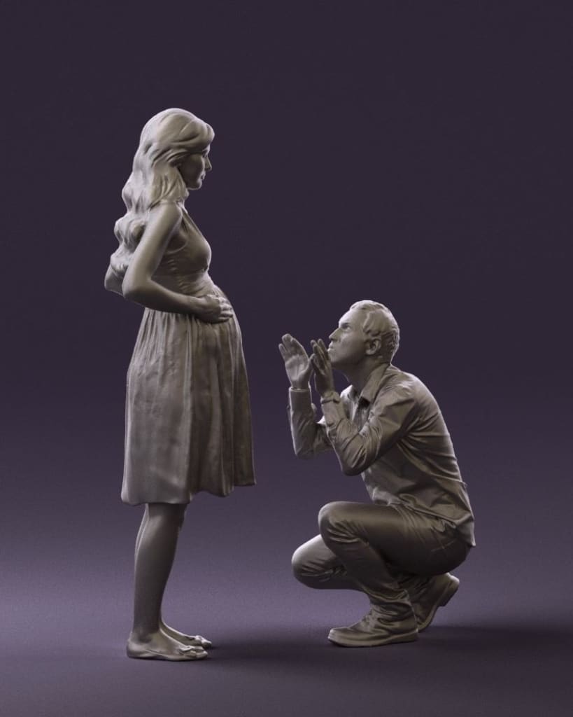 Male With Pregnant Female Figure