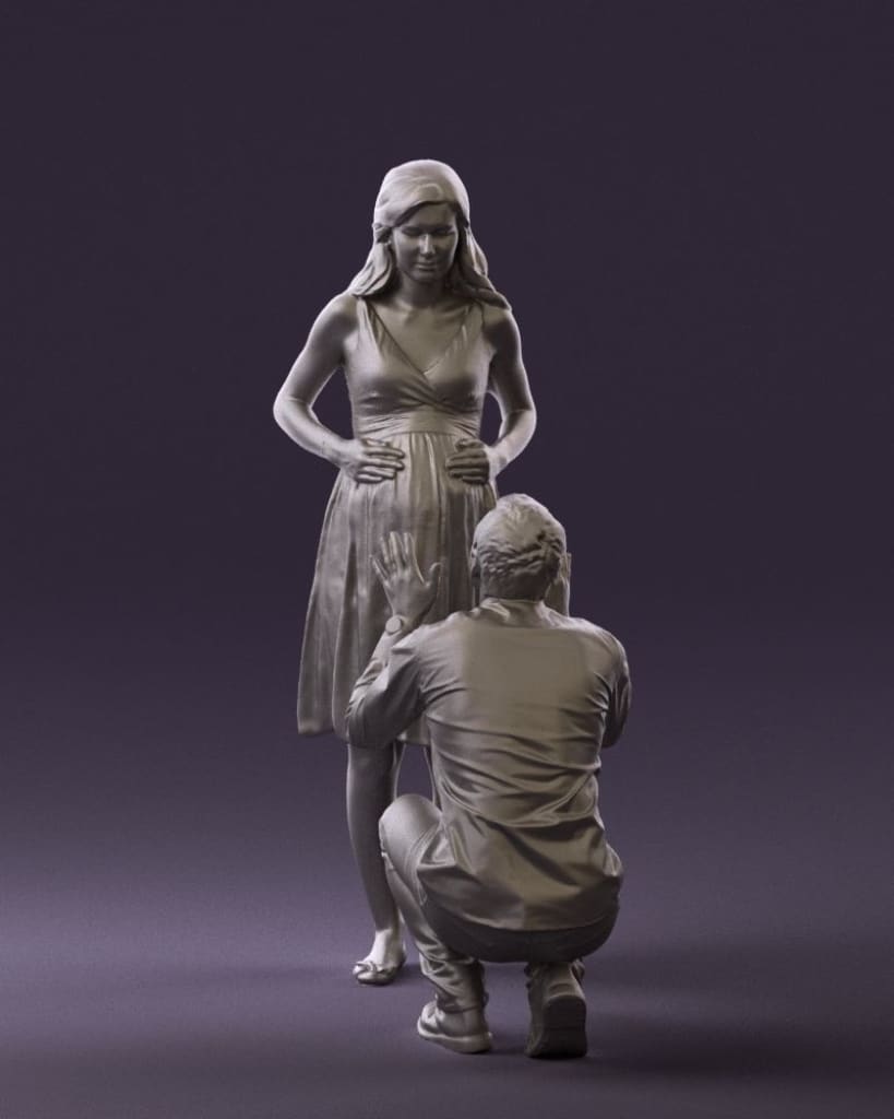 Male With Pregnant Female Figure