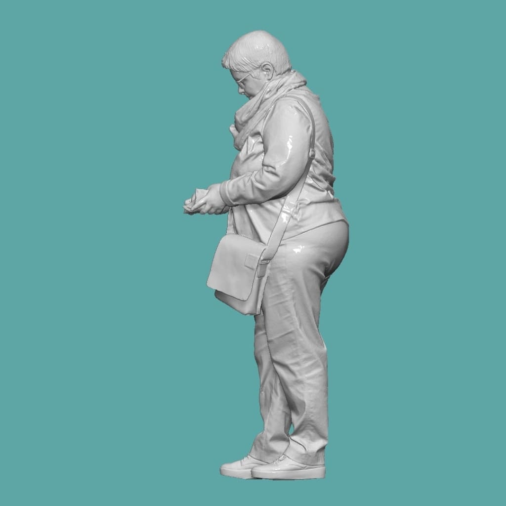 Mm853 Older Female Looking At Phone Figure