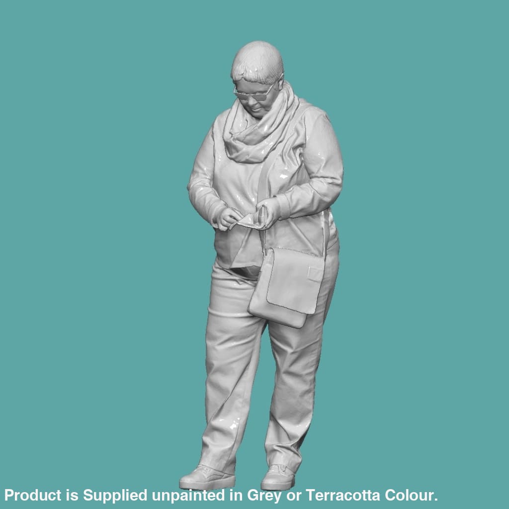 Mm853 Older Female Looking At Phone Figure